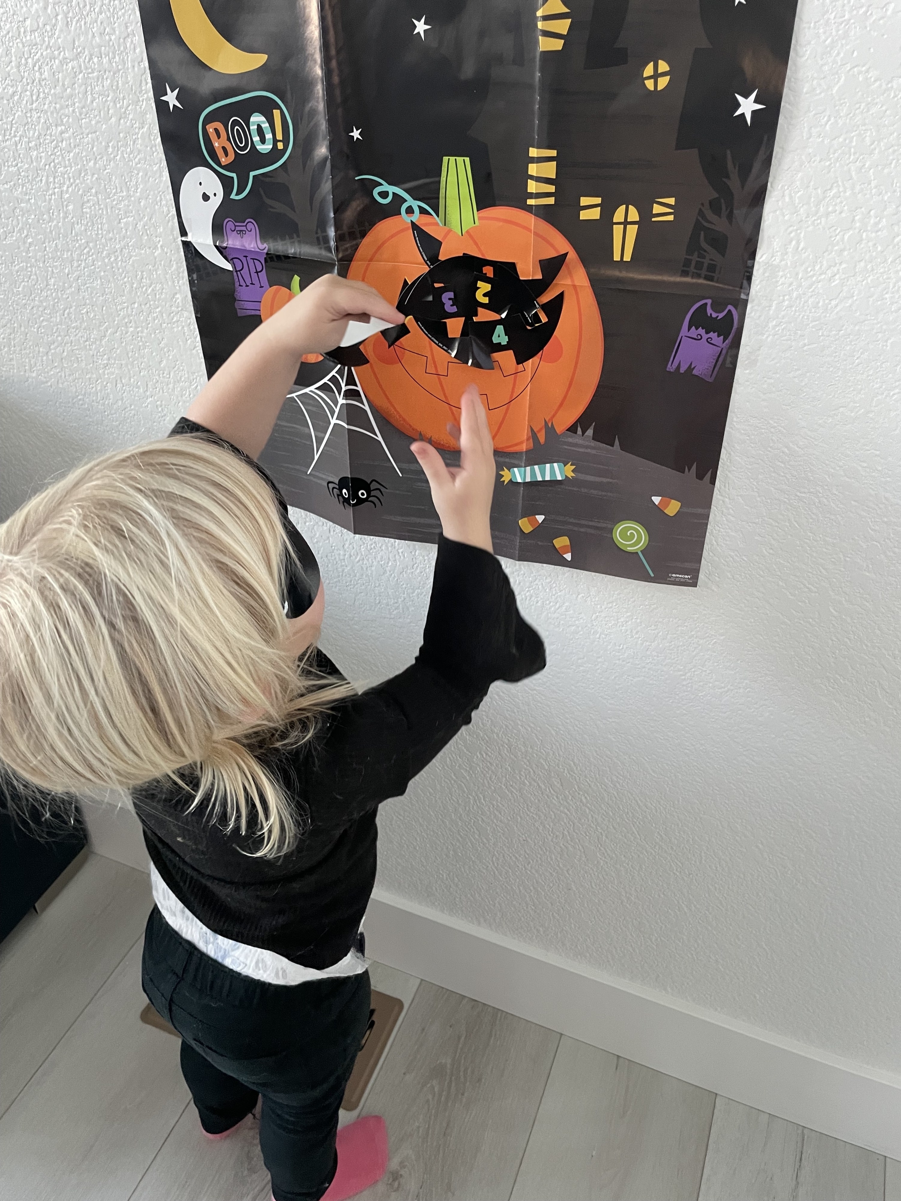 The author's kid playing a game